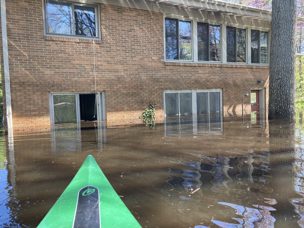 A photo of a flooding house in Midland, Michigan